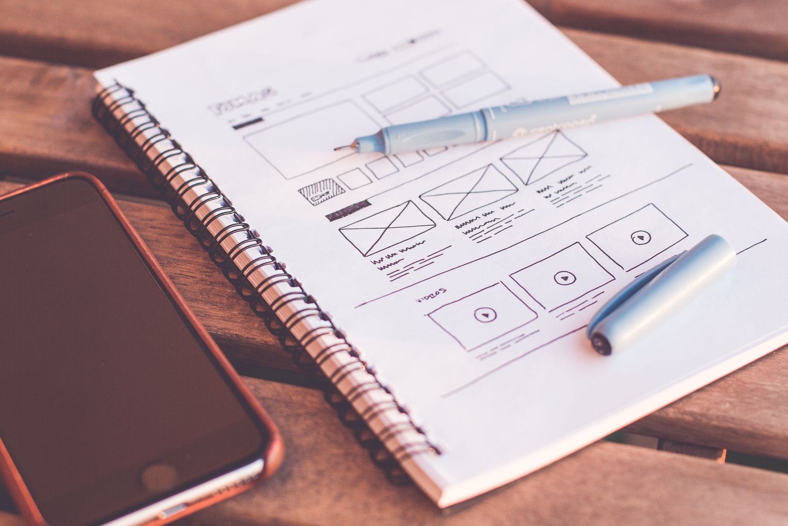 Notebook with a system sketched out.